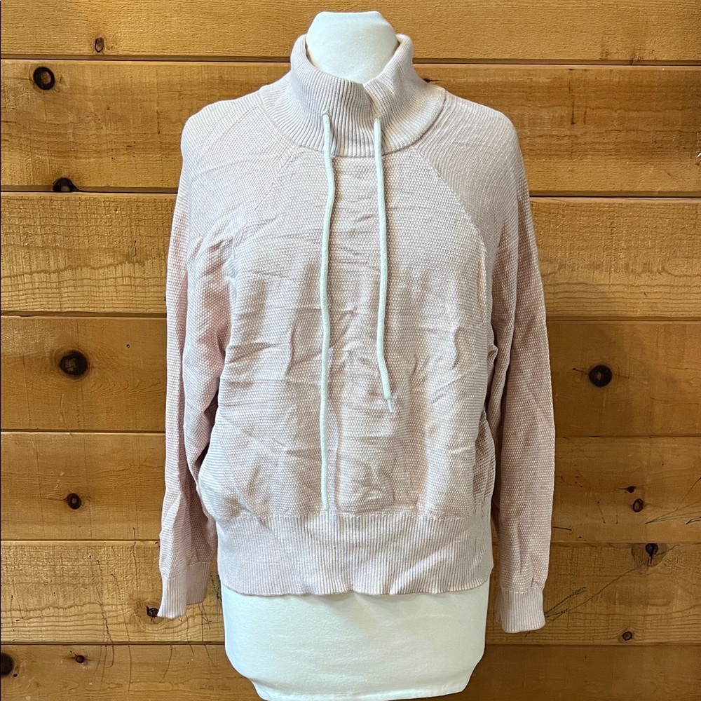 Varley Maceo mock neck textured sweatshirt in a light pink hue